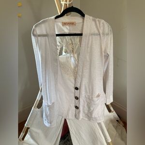 Cute white Reverse cardigan with crocheted skull on the back